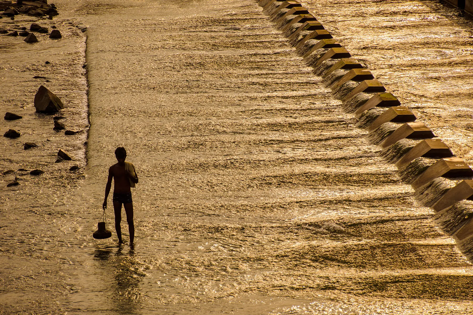 Child Walking Through Shallow Sea Water by Twin Lens
